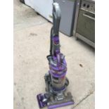 AN UPRIGHT DYSON DC15 WITH PET HAIR ATTRACHMENT BELIEVED IN WORKING ORDER BUT NO WARRANTY