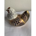 A ROYAL CROWN DERBY CHICKEN WITH WHITE METAL STOPPER