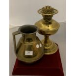 A LARGE BRASS JUG AND A BRASS OIL LAMP BASE