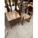 A SMALL WALNUT SEWING BOX ON CABRIOLE LEGS AND A RUSH SEATED CHILDS ROCKER