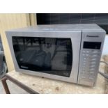 A PANASONIC INVERTER MICROWAVE - BELIEVED TO BE IN WORKING ORDER BUT NO WARRANTY