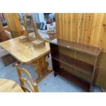 A PINE KITCHEN DINING TABLE, SWING FRAME MIRROR AND AN OPEN BOOKCASE