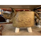 A FUAX LEATHER BROWN DINOSAUR FOOT STOOL