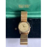 A BOXED ROTARY SUPER SPORT 9 CARAT GOLD CASED WRIST WATCH WITH ROLLED GOLD STRAP (A/F CROWN WINDER