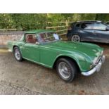 A 1962 TRIUMPH TR4 MOTOR CAR. 2.2 LITRE, 42197 MILES AT TIME OF CATALOGING, SURREY ALUMINIUM HARD