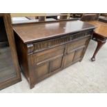 AN OLD CHARM STYLE OAK SIDEBOARD, 56" WIDE