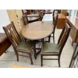 AN EARLY 20TH CENTURY OVAL OAK GATELEG DINING TABLE ON BARLEYTWIST LEGS, TOGETHER WITH FOUR OAK