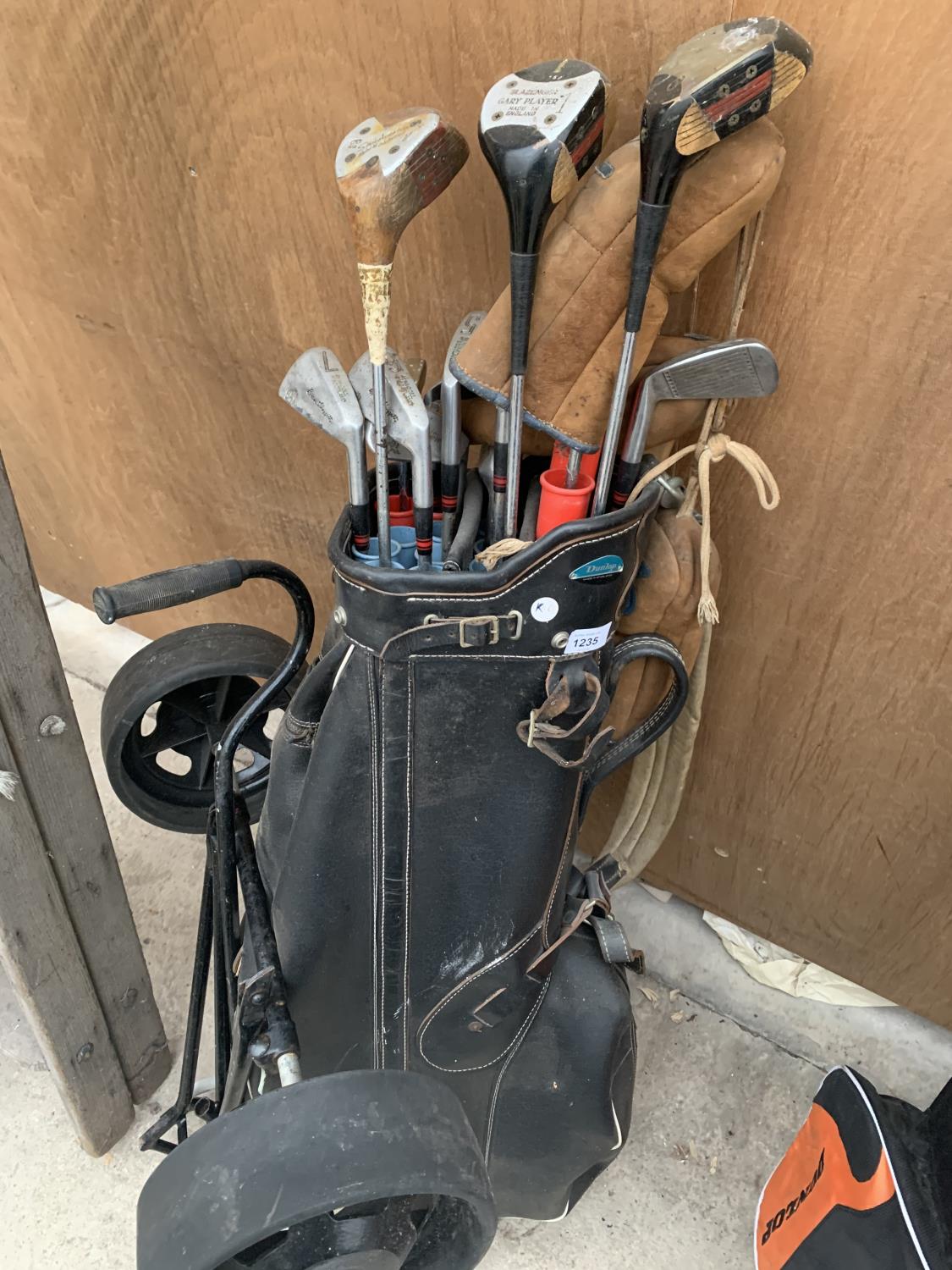 VINTAGE GOLF CLUBS IN A VINTAGE DUNLOP BAG WITH TROLLEY