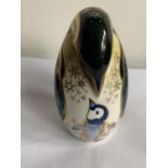 A ROYAL CROWN DERBY PENGUIN WITH WHITE METAL STOPPER