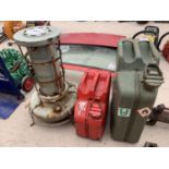 TWO VINTAGE PETROL CANS AND A VINTAGE OIL HEATER