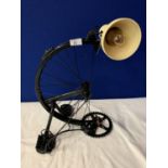 A MODERN TABLE LAMP UTILISING BICYCLE PARTS IN WORKING ORDER