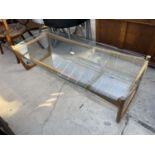 A RETRO G-PLAN TEAK FRAMED GLASS TOP COFFEE TABLE, 51x23"