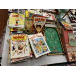 A GROUP OF VINTAGE ANNUALS TO INCLUDE OUR GIRLS, RUPERT, THE BEANO AND A PIN FOOTBALL GAME