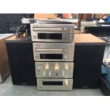 A TEAC HI-FI SYSTEM WITH SPEAKERS BELIEVED IN WORKING ORDER BUT NO WARRANTY
