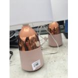 A PAIR OF PINK CERAMIC AND COPPER EFFECT TABLE LAMPS