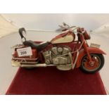 A TINPLATE RED MODEL MOTORBIKE