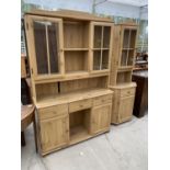 A MODERN PINE EFFECT DRESSER AND A PINE EFFECT CORNER CABINET