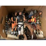 AN ASSORTMENT OF ACTION FIGURES TO INCLUDE COWBOYS AND INDIANS AND ACTION MAN