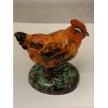 AN ANITA HARRIS SIGNED AND HAND PAINTED MODEL OF A HEN