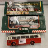 THREE MODELS TO INCLUDE TWO BOXED CORGI EDDIE STOBART WAGONS AND A COACH