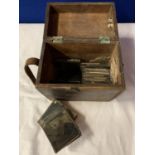 A VINTAGE WOODEN BOX CONTAINING VICTORIAN GLASS SLIDES