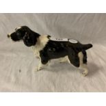 A BESWICK BLACK AND WHITE SPANIEL