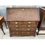 A GEORGE III OAK FALL FRONT BUREAU ON BRACKET FEET, WITH FITTED INTERIOR, 40" WIDE