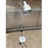 AN UPRIGHT LAMP WITH AN ADJUSTABLE HEAD BELIEVED IN WORKING ORDER BUT NO WARRANTY