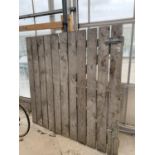 A VERY LARGE SLATTED WOODEN YARD GATE, WIDTH 182CM, HEIGHT 180CM