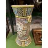 A VERY LARGE FLOOR STANDING VASE FEATURING A COUNTRYSIDE MOTIF AND PATTERN