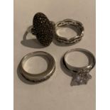 FOUR VARIOUS SILVER RINGS