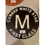 A CIRCULAR CAST METAL 'CUNARD WHITE STAR' FIRST CLASS SIGN
