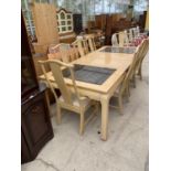 A BERNHARDT EXTENDING DINING TABLE (D100x42" FULLY EXTENDED) WITH INSERTED GLASS TOP AND EIGHT