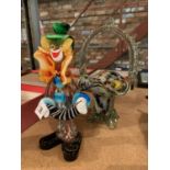 A MURANO COLOURED GLASS CLOWN AND BASKET