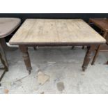 A SCRUB TOP MAHOGANY DINING TABLE