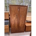 A RETRO TEAK TWO DOOR WARDROBE