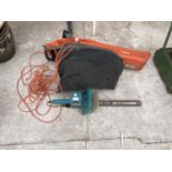 A FLYMO LAWN VAC AND A BLACK AND DECKER HEDGE TRIMMER