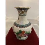 A FLOWER DECORATED CLOISONNE VASE