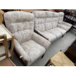 A PARKER KNOLL SETTEE AND TWO CHAIRS (PK 1240/1/2/3)