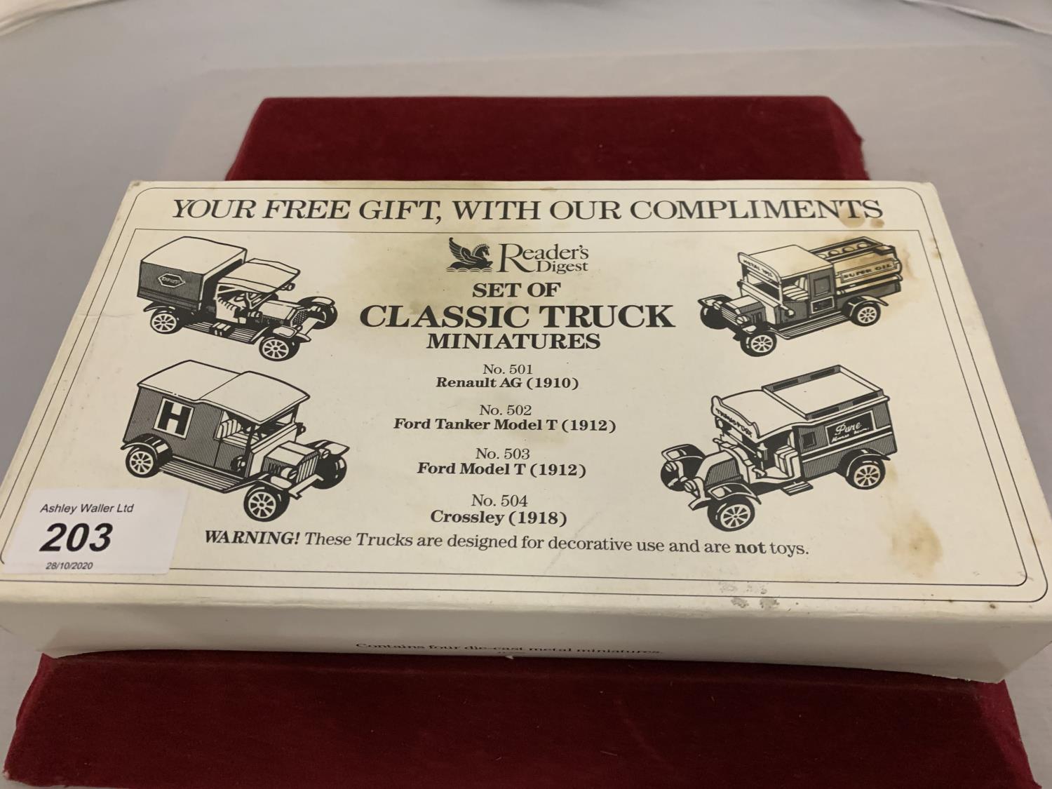 A BOXED SET OF FOUR CLASSIC TRUCK MINATURE MODELS