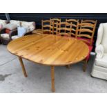 A MODERN PINE EXTENDING DINING TABLE 61x45" (FULLY EXTENDED) AND SIX LADDERBACK CHAIRS