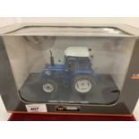A BOXED SCALE MODEL OF A UNIVERSAL HOBBIES FORD TW-30 4X4
