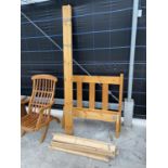 A 'STEAMER FURNITURE' TEAK STEAMER CHAIR AND PINE SINGLE BEDSTEAD