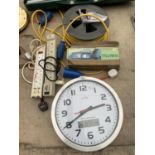 A LARGE RADIO CONTROLLED CLOCK, A 110V EXTENSION LEAD AND FURTHER EXTENSION LEADS