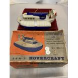 A VINTAGE BOXED TOY HOVERCRAFT BY 'MARX'