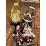 FOUR ASSORTED PORCELAIN HEADED DOLLS