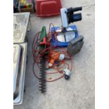 A COMPOUND MITRE SAW, HEDGE TRIMMER, DRILL AND BATTERY CHARGER