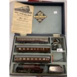 A TRIX TWIN RAILWAY BY BASSETT LOWKE OO GAUGE TRAIN SET COMPRISING OF AN ELECTRIC POWERED 4-6-2