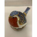 A ROYAL CROWN DERBY NESTING ROBIN