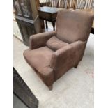 A SUEDE EASY CHAIR